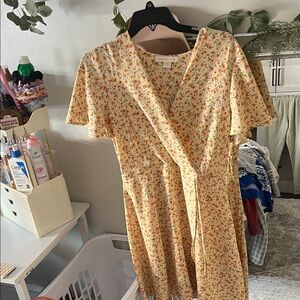 Floral Wrap Mini Dress in Yellow by [Brand]